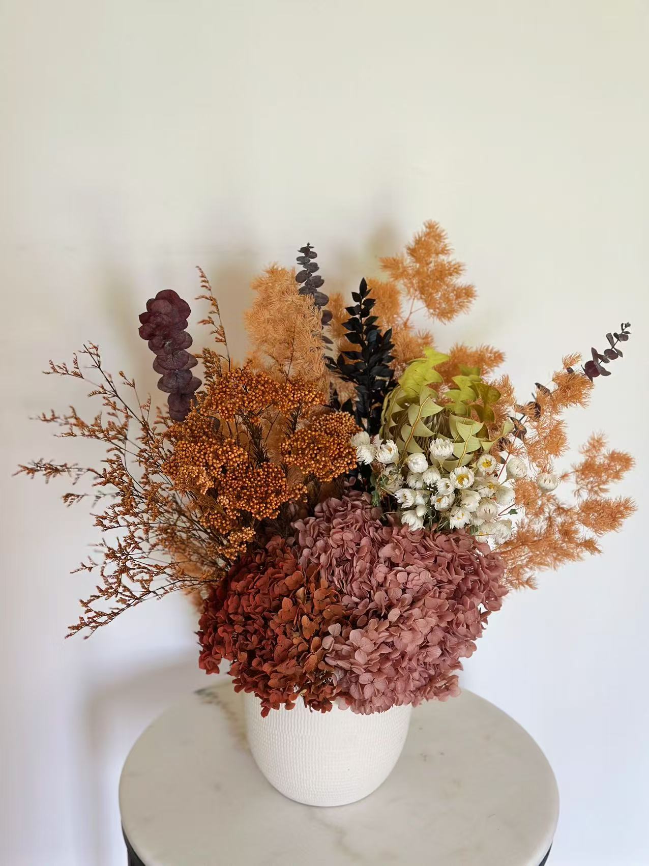 Amber Field Dry Flower Vase with preserved hydrangea, dried asparagus fern, eucalyptus and white everlasting daisies in warm amber tones | Pisces Flower Melbourne